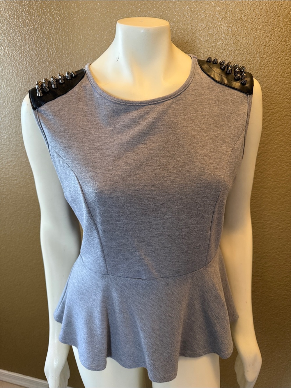 2B Bebe Gray Peplum Top with Black Studded Shoulders
